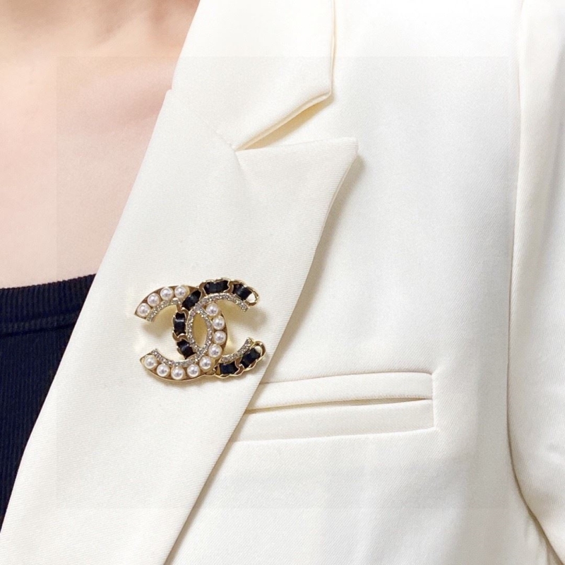 Ch*el brooches